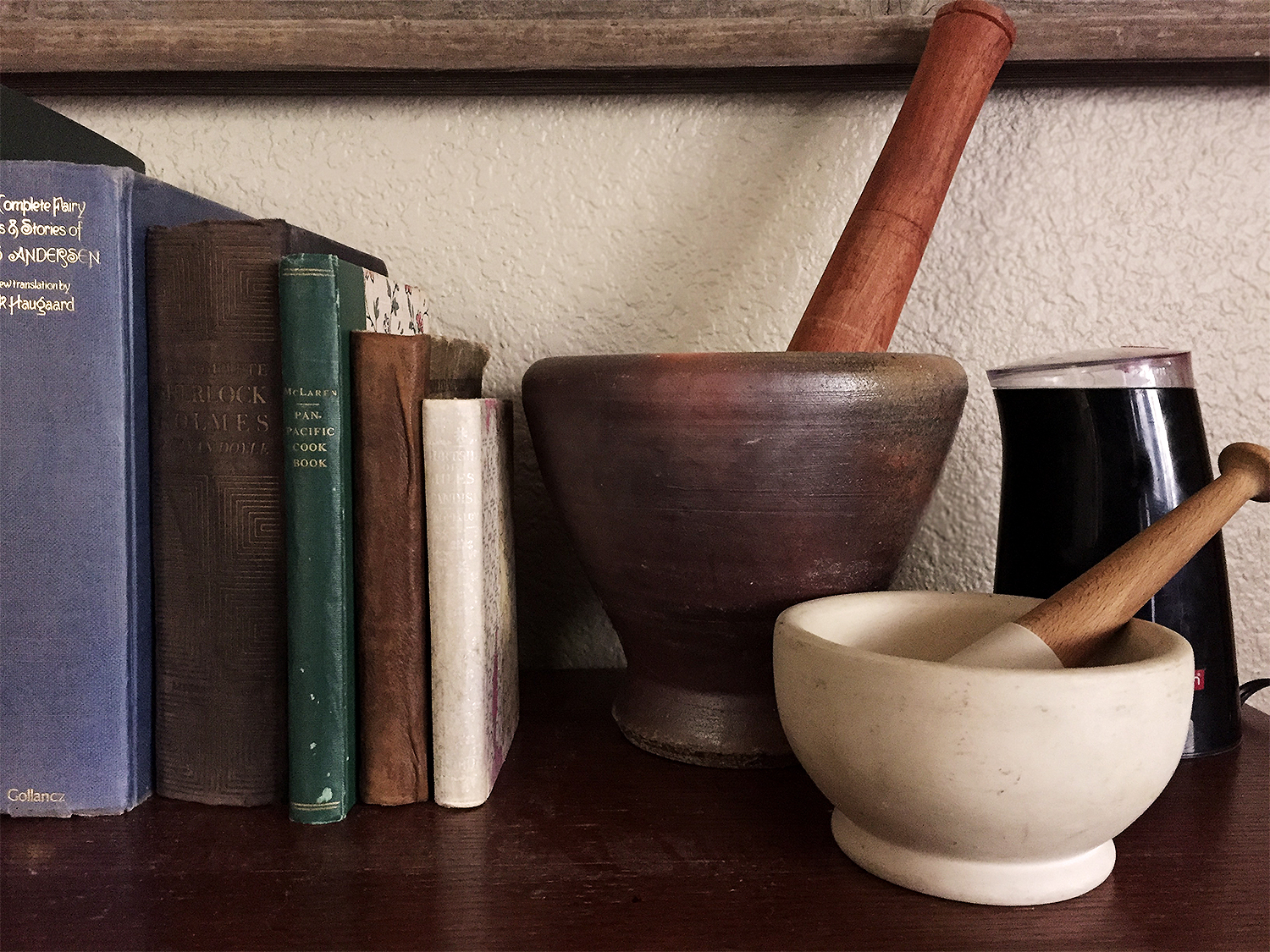 Mortar and pestles are good for rough grinds, while an electric spice grinder is good for a fine powder.