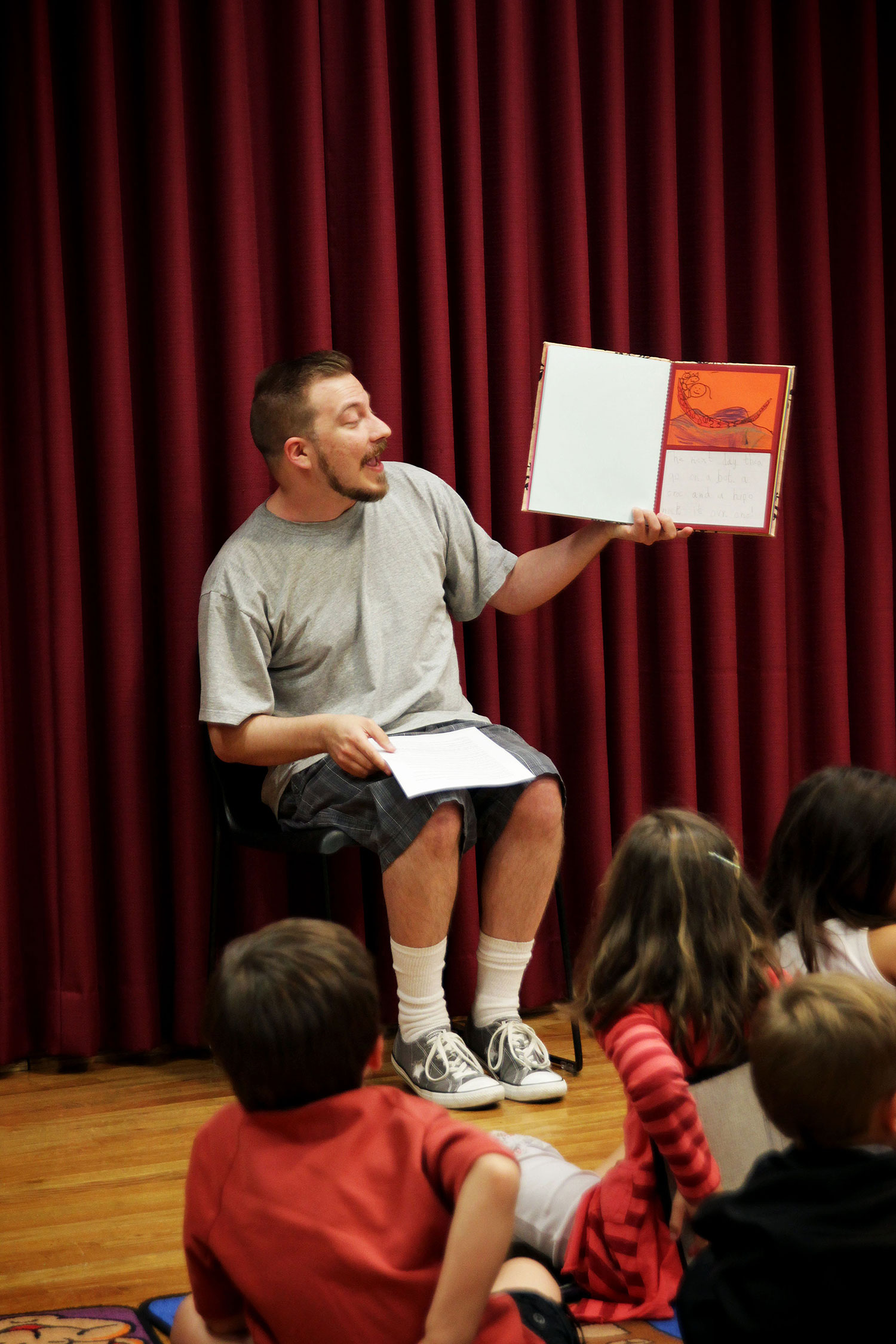 A childs book signing (Book writing for children: Laying foundations for peace)