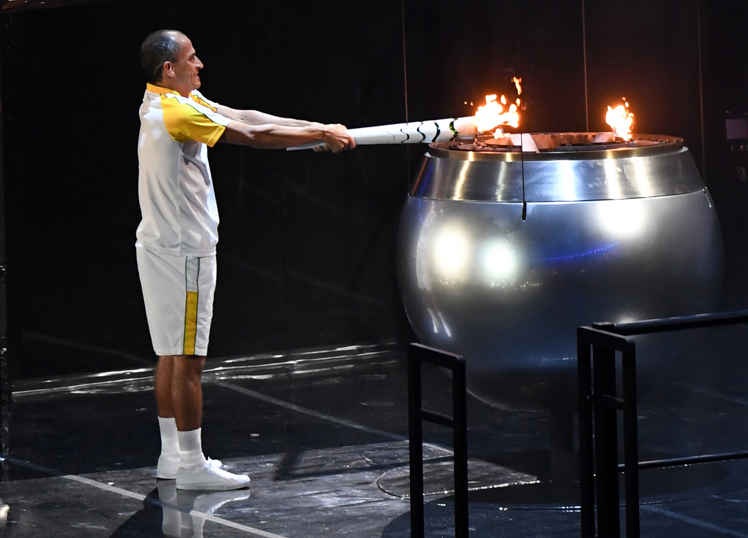 Vanderlei Cordeiro de Lima lights the Olympic cauldron during the Opening Ceremony of the 2016 Rio Olympic Games at Maracana Stadium in Rio de Janeiro, Brazil. U.S. Army photo by Tim Hipps, IMCOM Public Affairs.