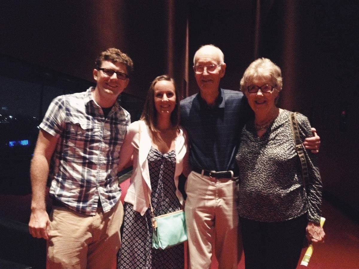 Four people smiling at the camera.