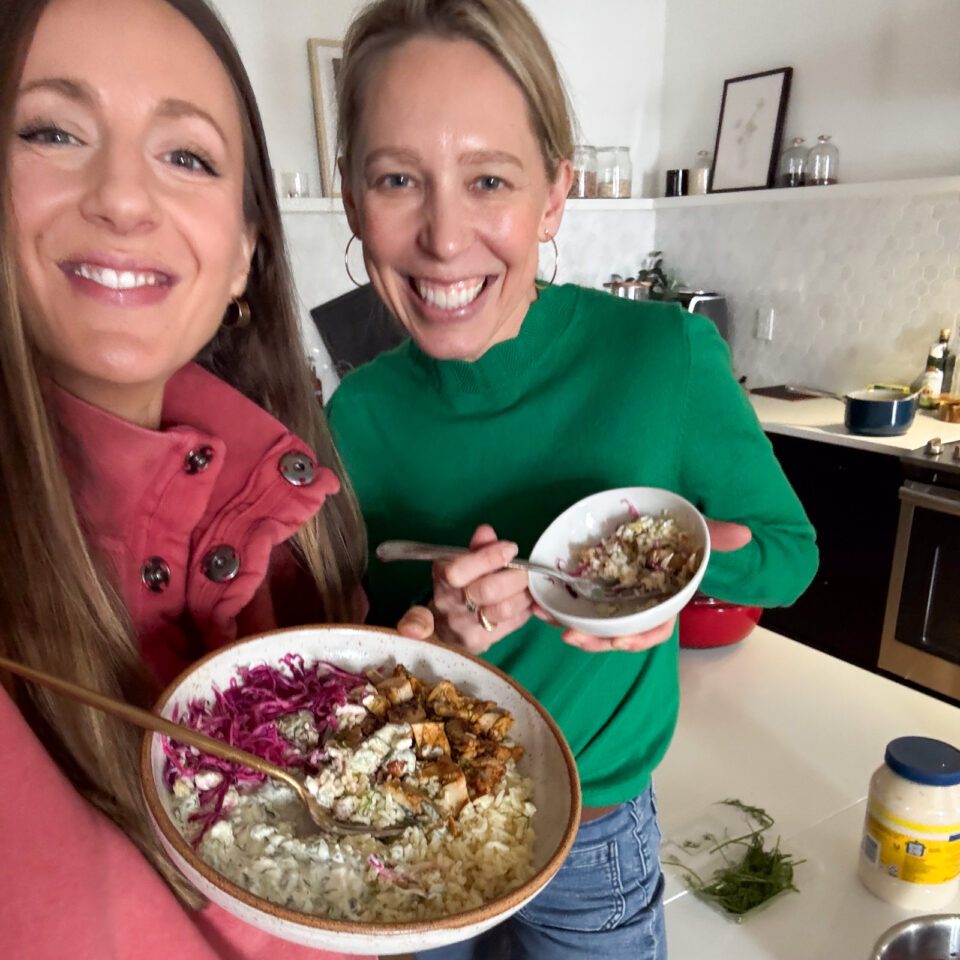 Lindsay and Amanda with chicken shawarma bowls.